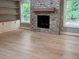 A long shot of the wooden flooring near firepit