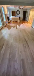 An empty living space with hardwood floor