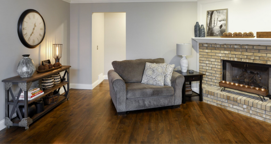 Living room featuring custom wood flooring and built-in wood accents, demonstrating how custom woodwork enhances interior design and overall warmth.